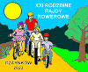 Czworo ludzi jadących rowerami po piaszczystej drodze z&nbsp;drzewem, krzewami, niebem i&nbsp;słońcem w&nbsp;tle