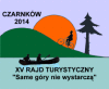 Logo XV edycji rajdu Kajakarze na tle zachodzącego za górę słońca