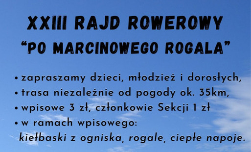 Treść plakatu z fotografią roweru na tle grunroweg drogi, łąki i lasu